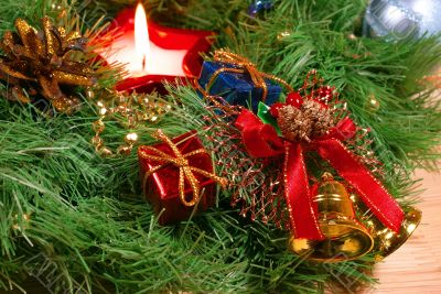 Xmas wreath with a candle and bells