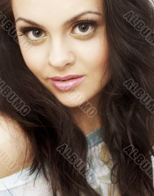 nice brunete girl in brown dress looking