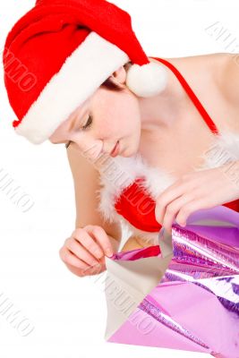 Christmas faerie unwrapping a present