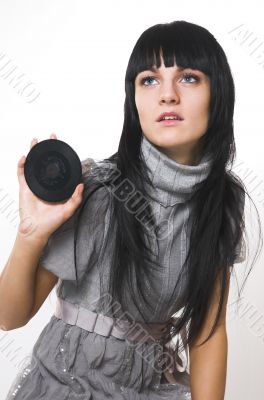 The beautiful brunette with a vinylic plate