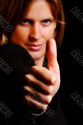 woman shows thumb