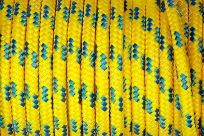 Heap of yellow and blue plastic ropes