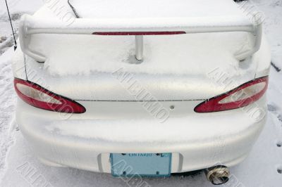 Snow covered car