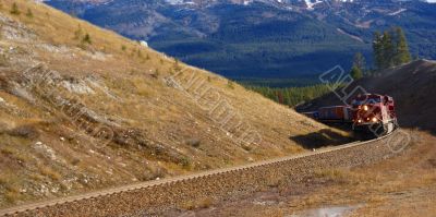 Freight train hauling up the Rocky Mountains