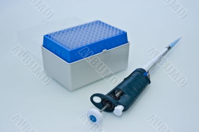 Pipette and box of pipette tips