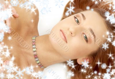green eyed redhead in collar with snowflakes