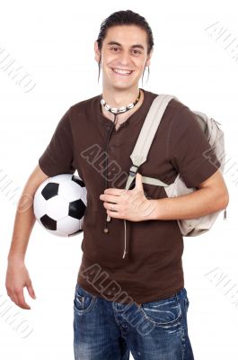 Young with soccer ball and backpack