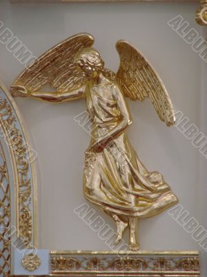 Golden angel figurine church decoration