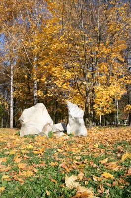 Autumn yellow alley with maple leaves background