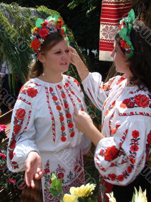 Two ukrainian girls in colorful folk costumes