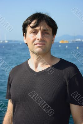 Elegant man near sea