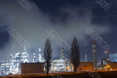 Oil rig with two trees