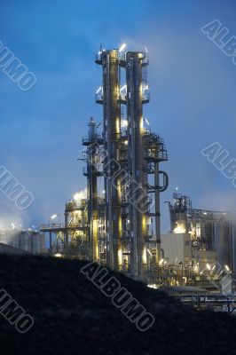 Oil refinery at dusk