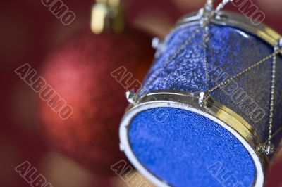 Christmas ball and drum background (selective and soft focus)