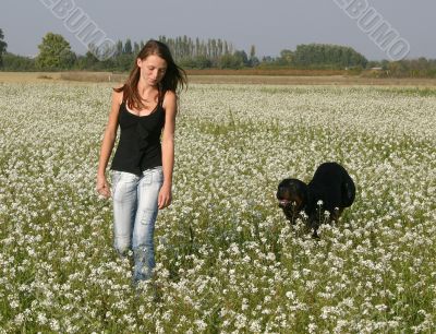girl and rottweiler