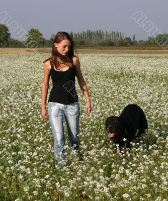 girl and rottweiler