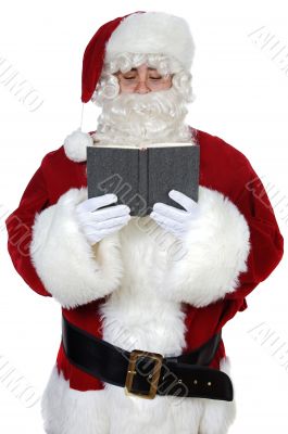 Santa Claus reading a book Santa Claus reading a book