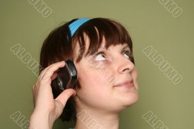 young woman calling by cellular phone