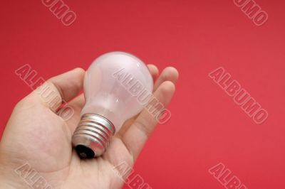 Background with lit lightbulb