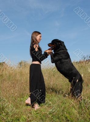 girl and rottweiler