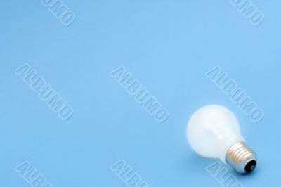 Background with lit lightbulb