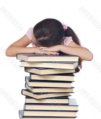 girl asleep on books