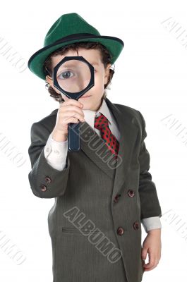 Kid with magnifying glass