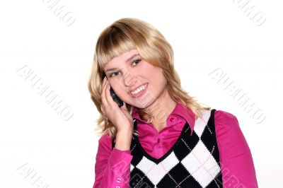 Young blond woman is calling by mobile phone