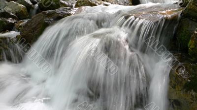 crystal clear river cascade