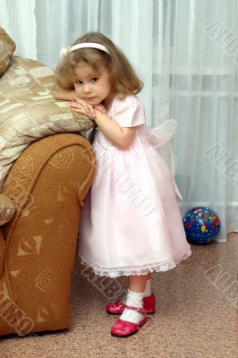 little girl in pink gown