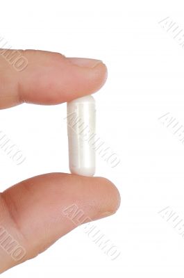 hand with a pill