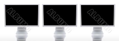 three monitors of computers