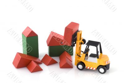fork-lift truck at toys construction place fork-lift truck at toys construction place
