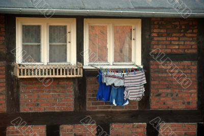 laundry hanging at the window