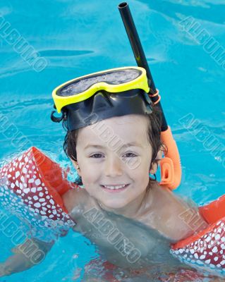 boy learning to swim