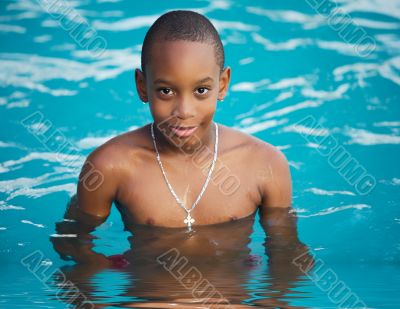 Boy in the swimming pool