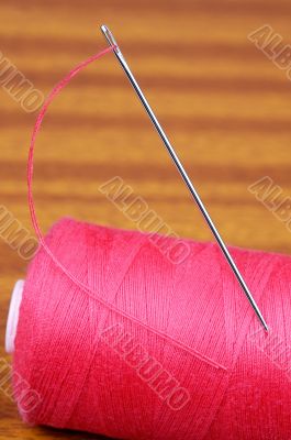 Needle with thread