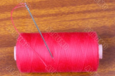 Needle with thread