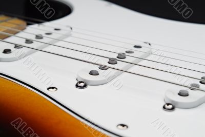 Electric guitar pickups and strings