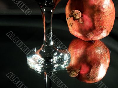 Pomegranate and wineglass