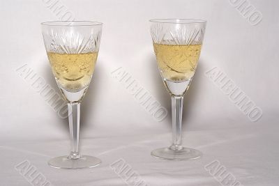Celebratory glasses with a champagne Celebratory glasses with a champagne
