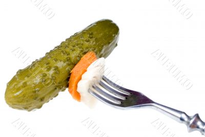 Pickled cucumber on a fork Pickled cucumber on a fork