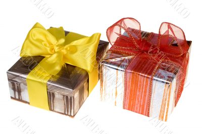 Presents with red ribbon isolated on white background