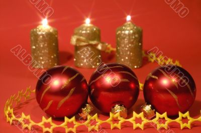 Gold candles and red glass balls