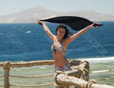 woman enjoying the sun on vacation