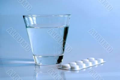Pills with glas water