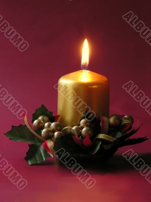 gold candle burning in Christmas night gold candle burning in Christmas night