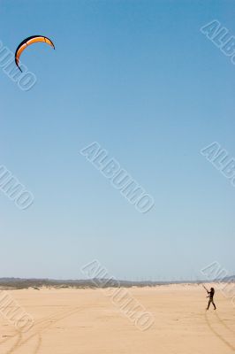 man flying kite