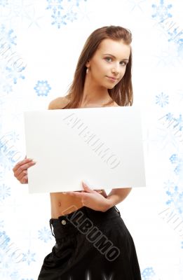 girl holding blank sign board with snowflakes