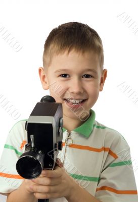 The boy with a retro movie camera